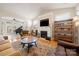 Spacious living room featuring a fireplace, vaulted ceiling and a view to the music room at 1103 Phar Lap Dr, Indian Trail, NC 28079
