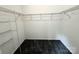 Walk-in closet with metal shelving and plush carpet at 11109 Pond Valley Ct, Charlotte, NC 28269