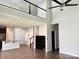 Spacious living room with hardwood floors, high ceilings, and an open floor plan at 11109 Pond Valley Ct, Charlotte, NC 28269