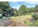 Large backyard with trees offering plenty of space and privacy at 112 Harmony Trl, Gastonia, NC 28056