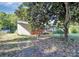 View of home and large tree in the front yard at 112 Harmony Trl, Gastonia, NC 28056