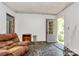Open living room with doorway to outside at 112 Harmony Trl, Gastonia, NC 28056