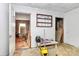 Interior shot of cluttered room with wood paneling and an air fryer at 112 Harmony Trl, Gastonia, NC 28056