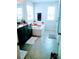 This bathroom features a bathtub with tile surround, a granite-topped vanity, and tiled floors at 1141 Overlake Dr, Belmont, NC 28012