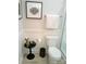 Cozy bathroom featuring a modern toilet, shower and a small side table with decor at 1141 Overlake Dr, Belmont, NC 28012