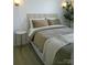 Comfortable bedroom with a queen bed and two lamps, perfect for relaxing and resting at 1141 Overlake Dr, Belmont, NC 28012