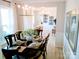 Dining room with dining set, view into home office, and wainscoting at 1141 Overlake Dr, Belmont, NC 28012