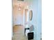 Bright foyer with light wood floors and a bench with decorative pillow and blanket at 1141 Overlake Dr, Belmont, NC 28012