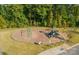This playground is nestled in a wooded area, offering a natural play setting for children at 1141 Overlake Dr, Belmont, NC 28012
