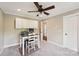 Functional office space with built-in cabinets, desk setup, and neutral decor at 1237 Saint Johns Ave, Matthews, NC 28104