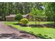 A well maintained home with great curb appeal and meticulous landscaping with mature trees at 1556 Stanley Lucia Rd, Mount Holly, NC 28120