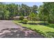 A well maintained home with great curb appeal and meticulous landscaping with mature trees at 1556 Stanley Lucia Rd, Mount Holly, NC 28120