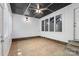 An airy sunroom featuring lots of windows, tile floors, and a unique ceiling at 1556 Stanley Lucia Rd, Mount Holly, NC 28120