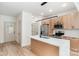 Modern kitchen featuring stainless steel appliances, a quartz countertop island, and light wood cabinetry at 177 Georgia Sw St, Concord, NC 28025
