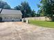 Wide driveway leading to an attached garage with well-maintained grassy areas at 2174 Eastview Rd, Rock Hill, SC 29732