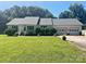 Charming single-story home with a well-manicured lawn and an attached two-car garage at 2174 Eastview Rd, Rock Hill, SC 29732