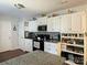 Kitchen featuring white cabinets, granite countertops, and appliances at 2174 Eastview Rd, Rock Hill, SC 29732