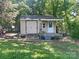 Backyard shed with a porch and ramp, providing extra storage and workspace at 2174 Eastview Rd, Rock Hill, SC 29732