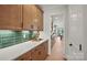 Walkway with wooden cabinets, stone countertop, and view of a chef's kitchen at 2192 Millennium Dr # 91, Lancaster, SC 29720