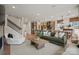 Open-concept living area with hardwood floors, modern finishes, seamless flow to the kitchen and dining areas at 2192 Millennium Dr # 91, Lancaster, SC 29720
