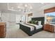 Spacious main bedroom showcasing a tray ceiling, plush carpeting, a seating area, and natural light at 2192 Millennium Dr # 91, Lancaster, SC 29720