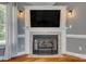 Close-up of a fireplace with a decorative mantel and mounted television at 2289 Veery Ln, Rock Hill, SC 29732