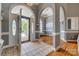 Grand foyer with tiled floor and open archways leading to the dining area, offering an elegant entrance at 2289 Veery Ln, Rock Hill, SC 29732