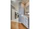 View of kitchen area, showcasing tile backsplash, stainless steel fridge, and kitchen sink at 2289 Veery Ln, Rock Hill, SC 29732
