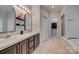 The main bathroom features dual sinks, a large mirror, a shower, and a soaking tub at 2289 Veery Ln, Rock Hill, SC 29732