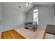 Bright office space with vaulted ceiling, sleek desk, and a pink accent rug at 2289 Veery Ln, Rock Hill, SC 29732