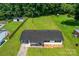 Aerial view of home with large backyard and mature trees at 2610 Fairgreen Dr, Gastonia, NC 28056