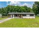 Charming one-story brick home with inviting front yard at 2610 Fairgreen Dr, Gastonia, NC 28056