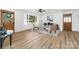 Bright living room features beautiful floors, ample natural light, and neutral paint at 2610 Fairgreen Dr, Gastonia, NC 28056