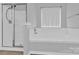 Bathroom includes a shower with glass doors, a built-in tub, and tile flooring at 280 Glenn Allen Rd, Mooresville, NC 28115