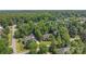 Aerial view of community featuring mature trees and well-maintained homes at 2909 Arbor Knl, Concord, NC 28025