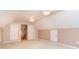 Finished attic space with angled ceilings, dormers, and doors for extra storage at 2909 Arbor Knl, Concord, NC 28025