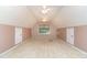 Spacious finished attic with plenty of natural light, creating a versatile living area at 2909 Arbor Knl, Concord, NC 28025