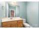 Half bathroom with vanity, and neutral color palette at 2909 Arbor Knl, Concord, NC 28025