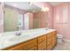 Bathroom featuring a double sink vanity, and a separate shower area at 2909 Arbor Knl, Concord, NC 28025