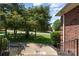 Inviting front entrance with brick detailing and a welcoming 'Welcome Friends' mat at 2909 Arbor Knl, Concord, NC 28025