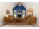Cozy living room features a fireplace, vaulted ceiling, and ample seating at 2909 Arbor Knl, Concord, NC 28025