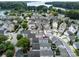 Aerial view of a residential neighborhood with well-maintained homes and mature trees at 298 Bridges Farm Rd, Mooresville, NC 28115