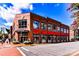 Exterior view of the Davidson College Store, featuring red awnings, large windows, and brick facade at 298 Bridges Farm Rd, Mooresville, NC 28115