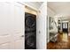 Convenient laundry closet with a stacked washer and dryer unit, maximizing space and efficiency at 298 Bridges Farm Rd, Mooresville, NC 28115