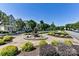 Well-maintained neighborhood with beautiful landscaping and a decorative fountain at 298 Bridges Farm Rd, Mooresville, NC 28115