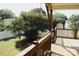 Spacious backyard view from the wooden deck, enhanced by green grass and lush trees at 315 Second St, Stanley, NC 28164