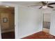 Bright bedroom featuring hardwood floors, classic trim, and closet at 315 Second St, Stanley, NC 28164
