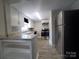 Bright kitchen with stainless steel appliances, granite countertops, and ample cabinet space at 315 Second St, Stanley, NC 28164
