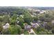 A high aerial perspective captures the home nestled within a lush, green neighborhood, providing a sense of community and serenity at 318 N Laurel N St, Lincolnton, NC 28092