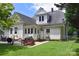 Spacious backyard featuring a patio area and lush green lawn, perfect for outdoor activities at 318 N Laurel N St, Lincolnton, NC 28092